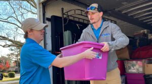 unloading a tote from a moving truck